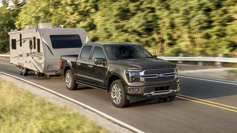 Ford F-150 towing a camper trailer