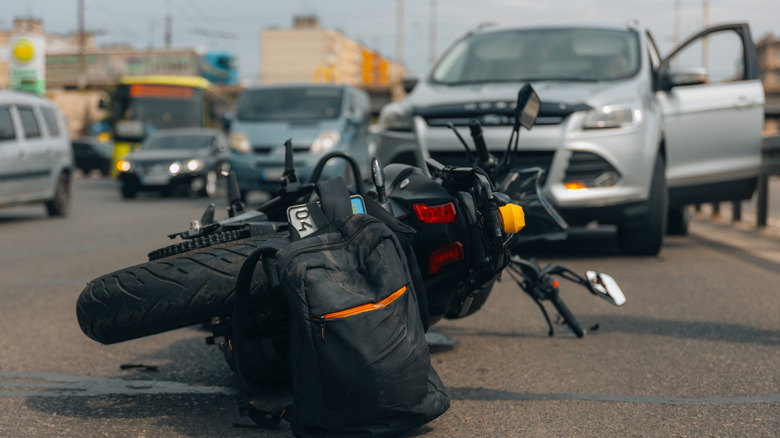 Crashed motorcycle on road