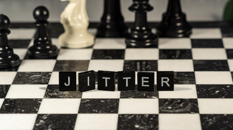 Jitter represented by chess and Scrabble pieces