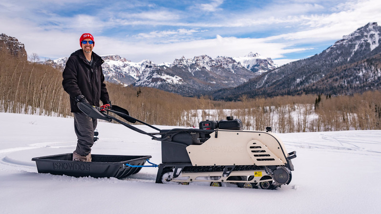 Person riding Snowdog Grand Mesa Colorado