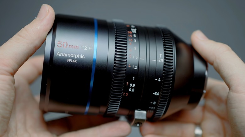 Anamorphic camera lens in hand