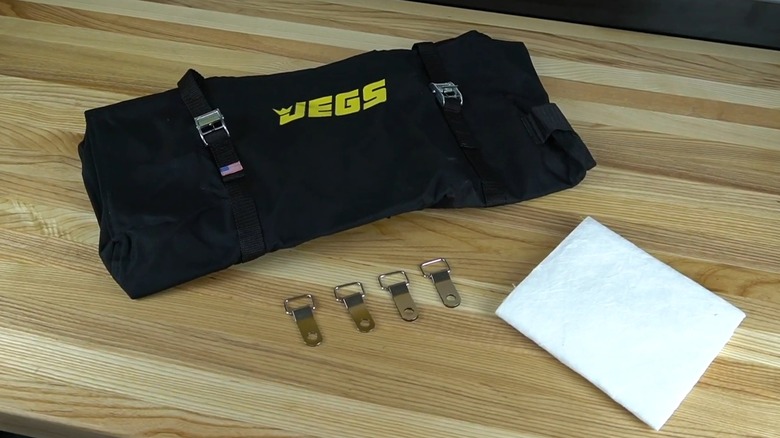 A JEGS engine diaper kit laid out on a table.