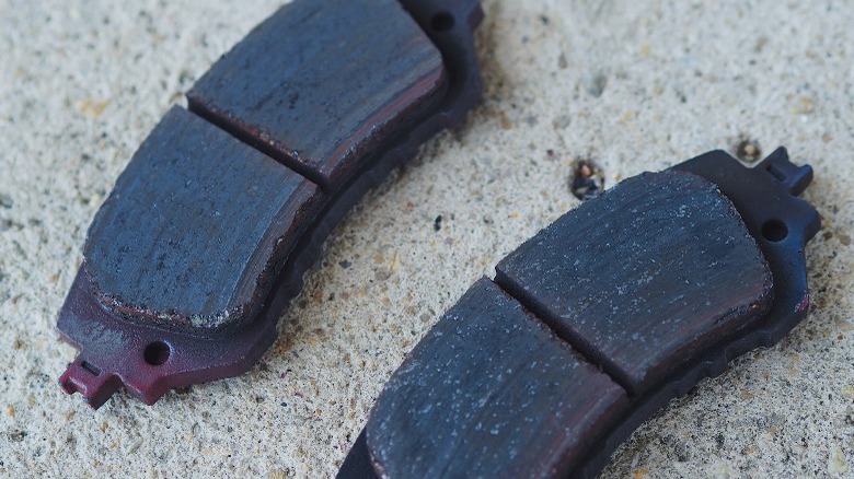 Worn brake pads with slots