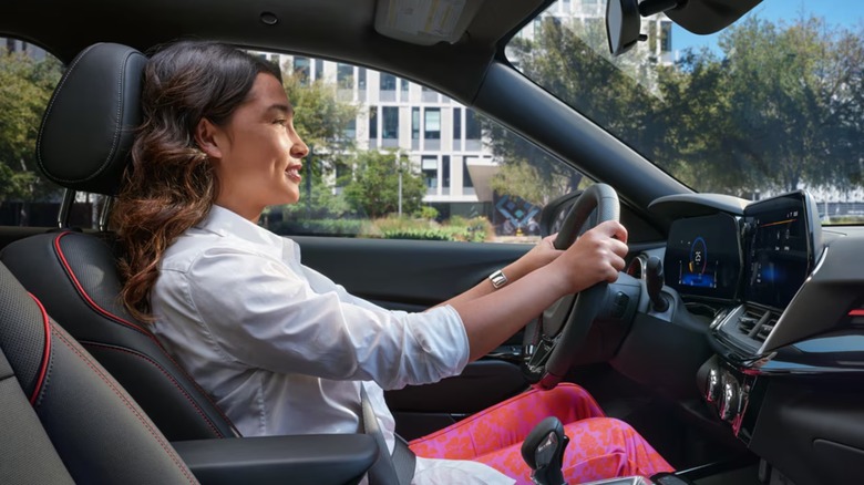 Woman driving Chevy vehicle