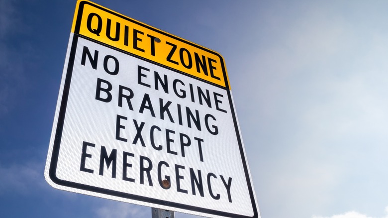 A traffic sign prohibiting engine braking