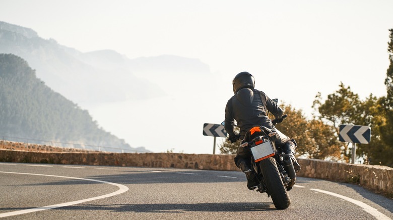 Motorcycle riding on mountain road