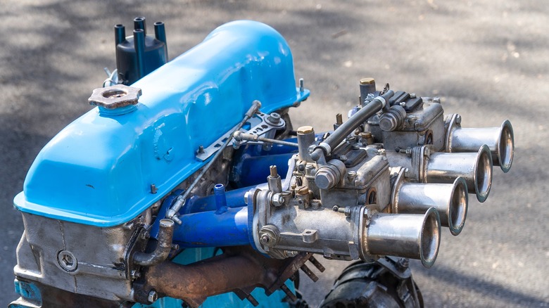 Blue-painted engine on ground