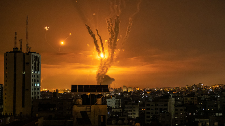 Incoming rockets being intercepted  by the Iron Dome