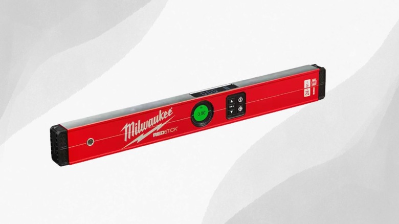 Milwaukee Tools Redstick digital level on graphic background