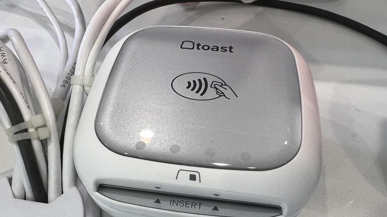 A Toast contactless payment reader