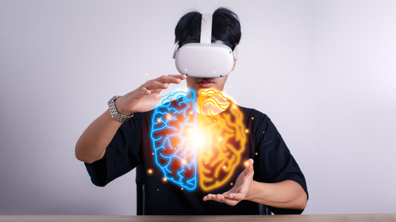 Person wearing VR headset with digital brain image