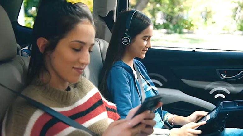 Passengers using Subaru Solterra Connect Wi-Fi feature