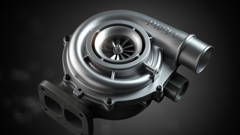 Car turbocharger on black background