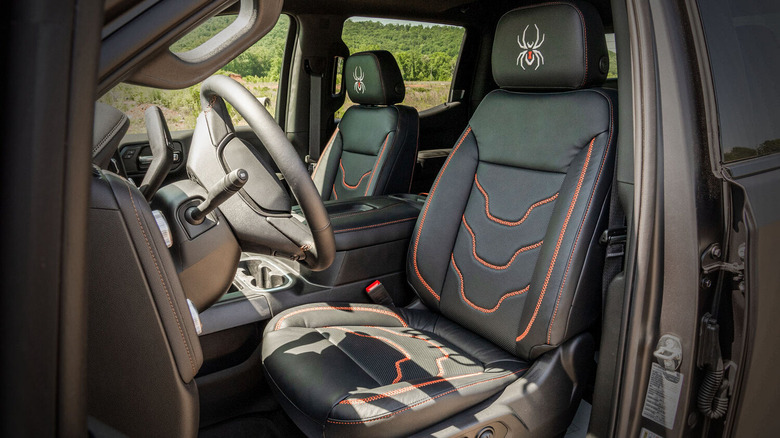 Interior of a GMC 1500 Limited with custom stitching.