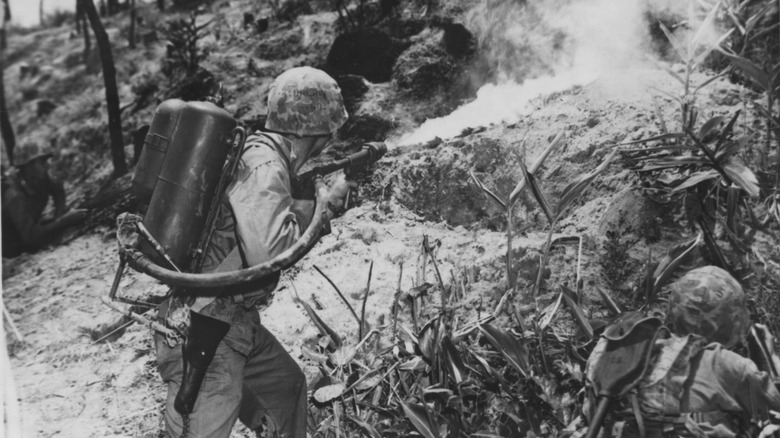 Marine shooting a flamethrower