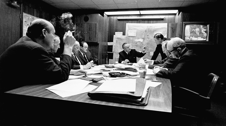 Lyndon B Johnson in a situation briefing room