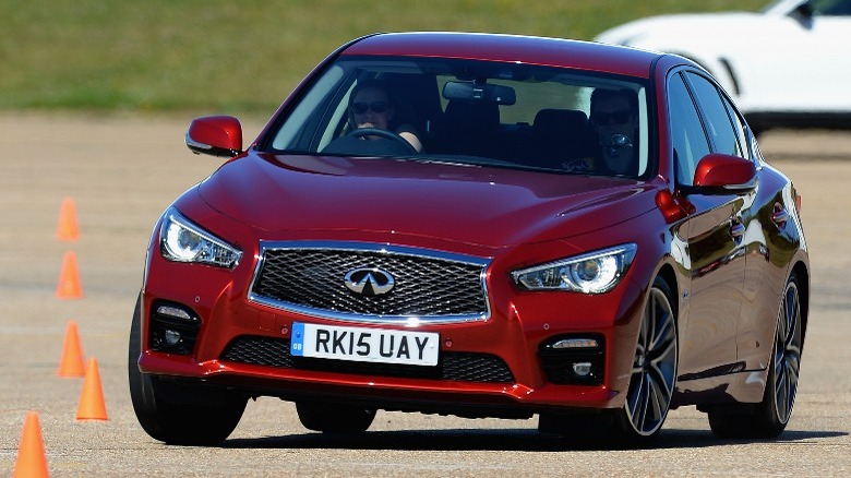 red Infinity sedan doing a maneuverability test