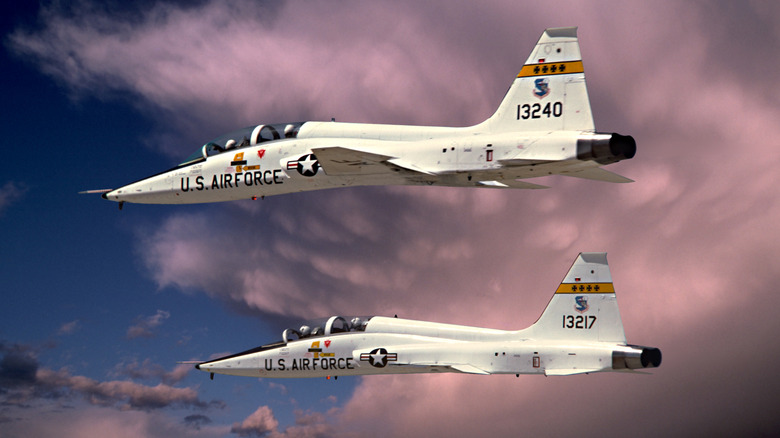 A pair of T-38s flying next to each other