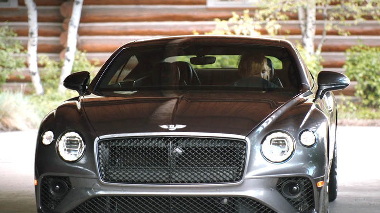 Beth pulling up in her Bentley Continental GT