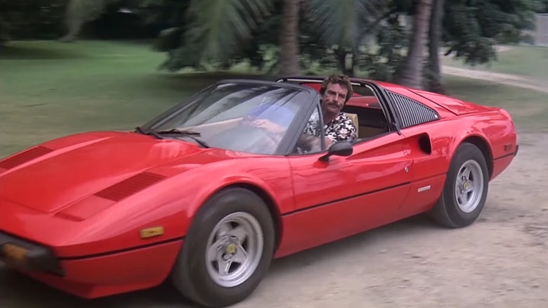 Tom Selleck As Magnum PI Driving A Red Ferrari 308