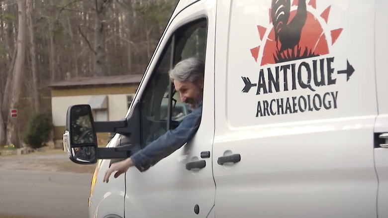 Mike Wolfe leaning out of Antique Archaeology van on American Pickers