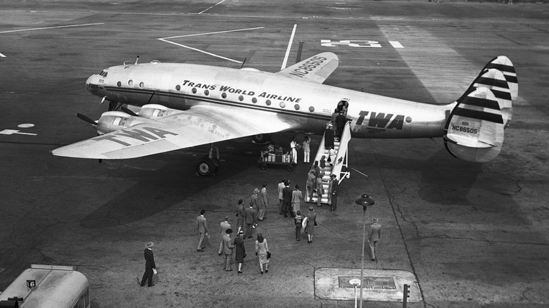 passengers boarding a Lockheed Constellation