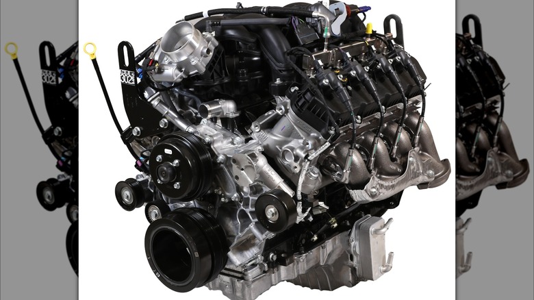 A complete 7.3L Ford crate engine on a white background.