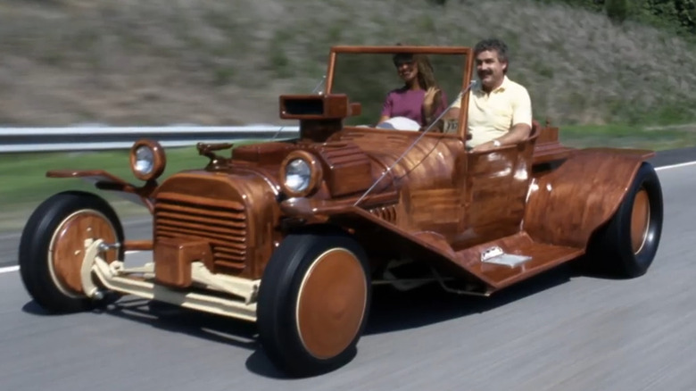 Wooden Model T being driven on highway