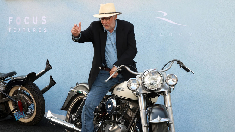 Danny Lyon sitting on a motorcycle