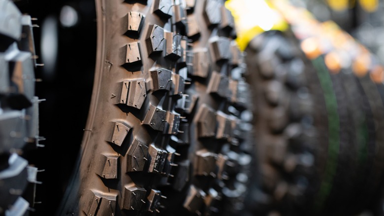 A row of dirt bike tires