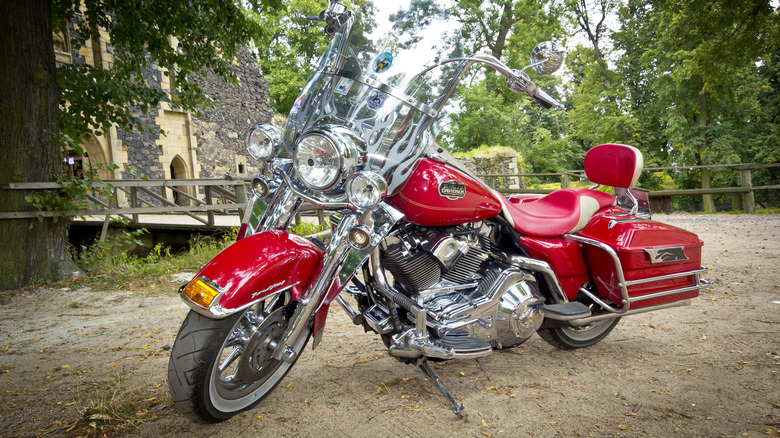 Harley Davidson parked on dirt