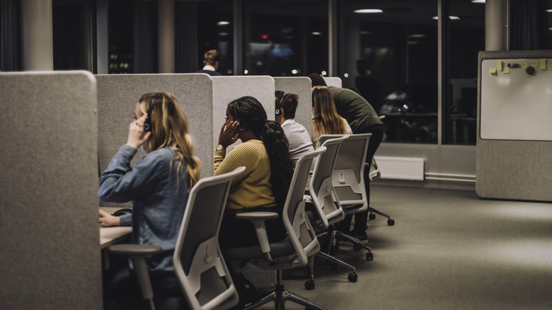 office workers in cubicle