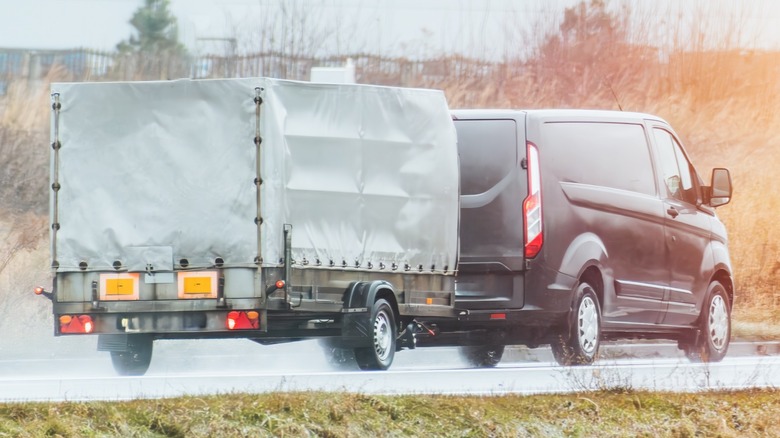 car towing trailer