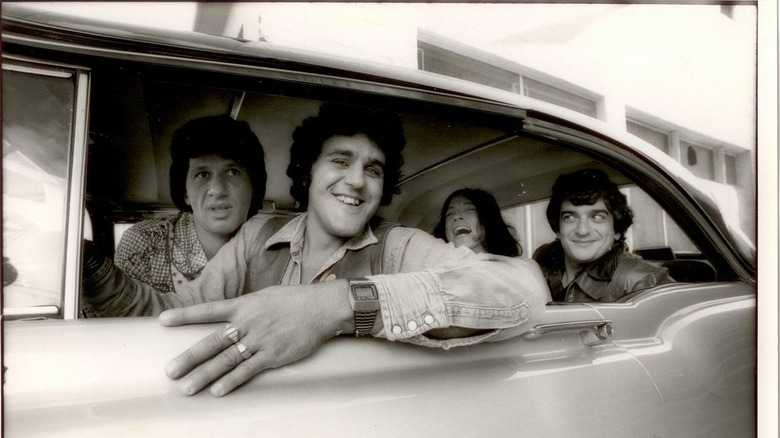 Young Jay Leno in classic car