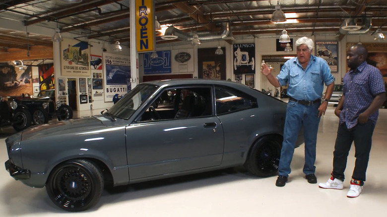 Jay Leno and guest with 1973 Mazda RX3