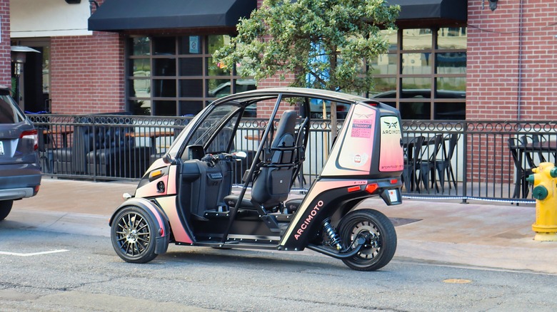 An Arcimoto FUV parked