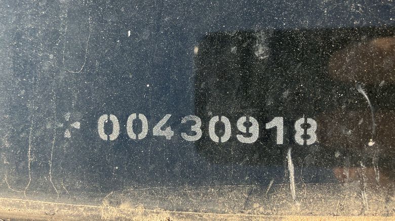 number code stamped on windshield of Spanish car