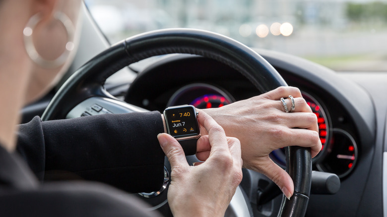 woman checking out her Apple Watch