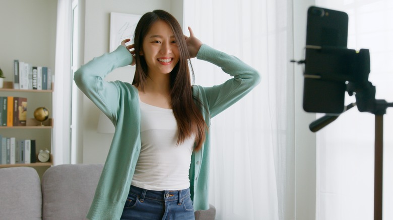 Girl recording a social media video