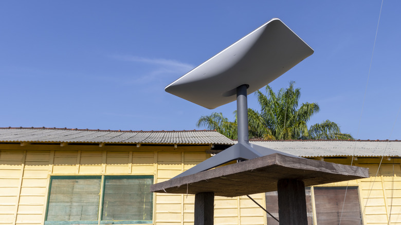 Starlink Standard Actuated installed outside near houses