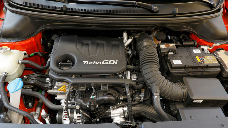 An engine bay showing a GDi engine