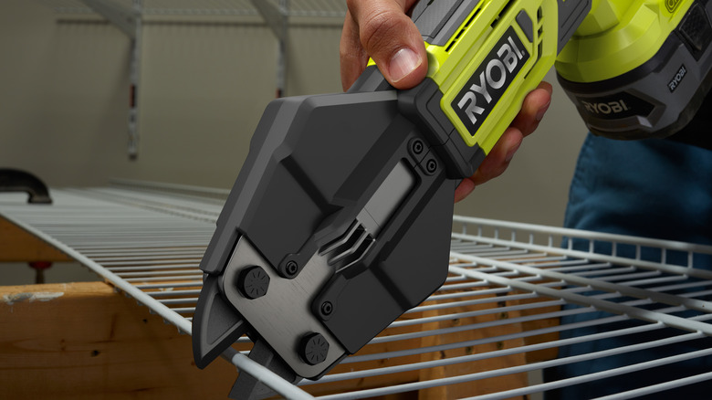 Ryobi bolt cutter cutting through shelving