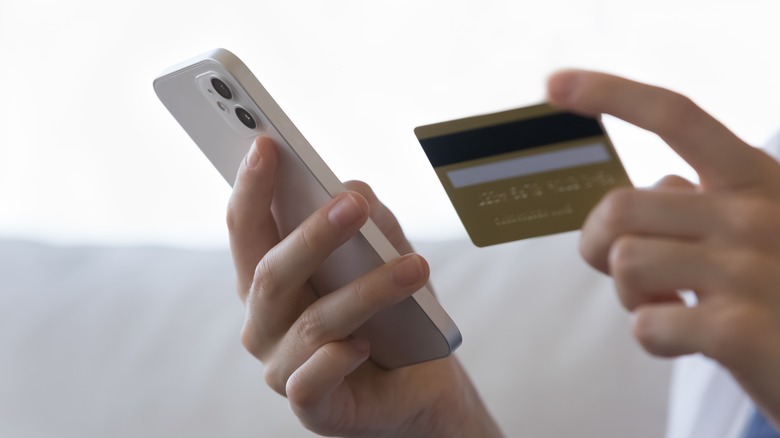 credit card next to smartphone