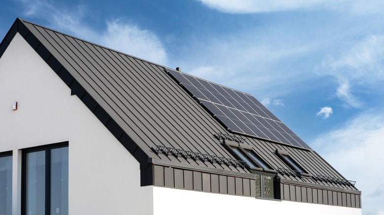 Solar panels on standing seam metal roof