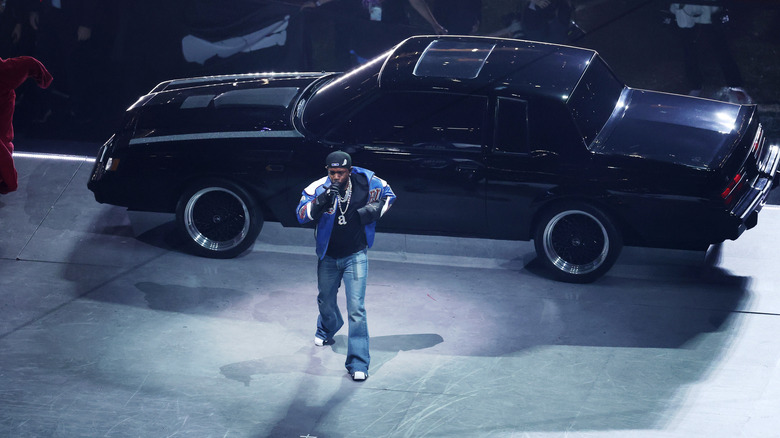 Kendrick Lamar on stage with car during 2025 Super Bowl halftime show