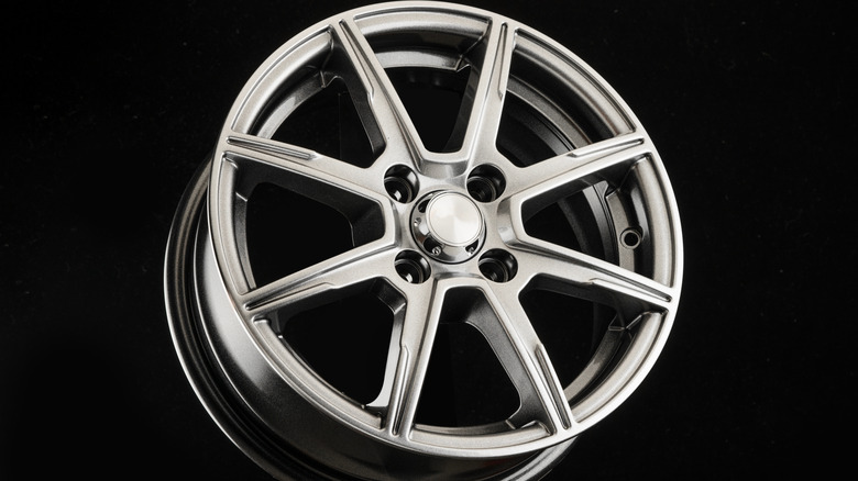 One aluminum alloy wheel with a black background