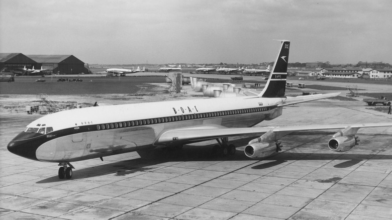 a Boeing 707 parked at airfield