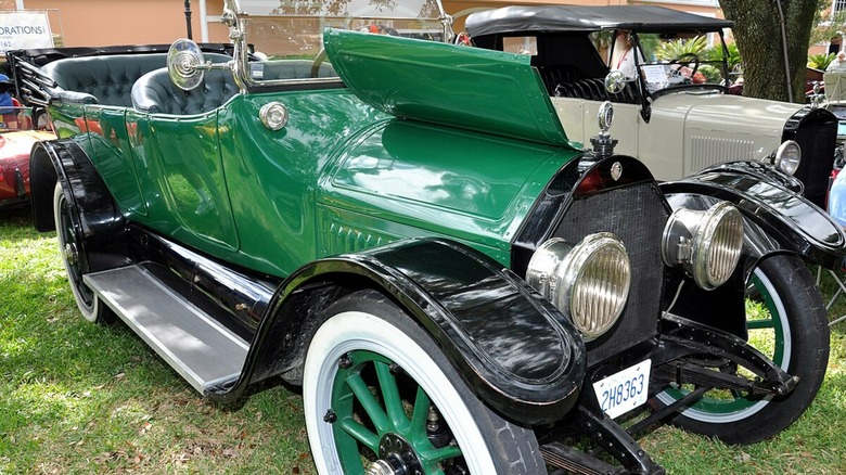 A green Cadillac Type 51 parked on grass