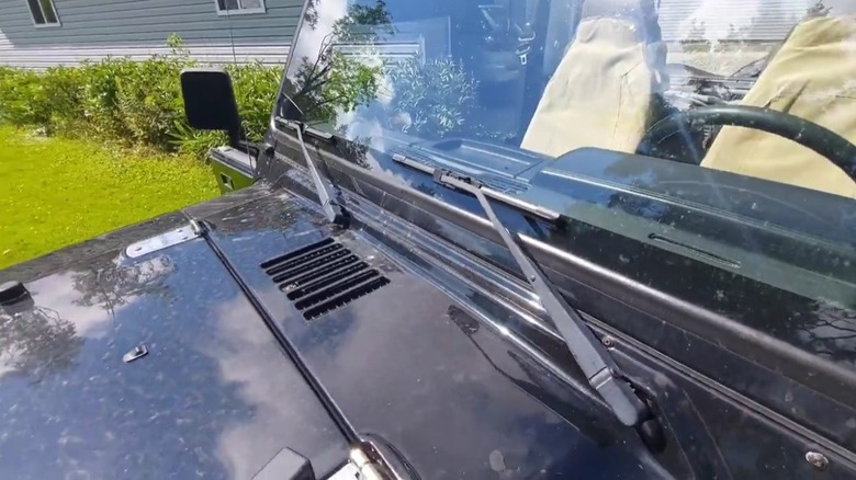 The 7-bar grille cowl on a Jeep Wrangler.