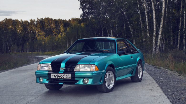 1993 Fox Body Mustang in forest road